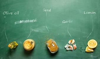 Ingredients for making mustard with inscriptions. photo