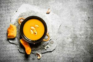 Pumpkin soup with seeds. photo