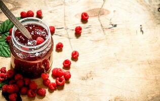 Sweet jam with raspberries. photo