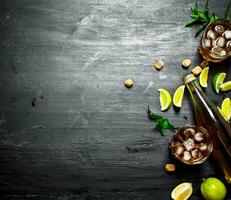 Rum with ice , mint and fresh lime. photo