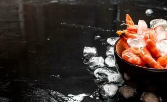 Shrimp with ice in a bowl. photo