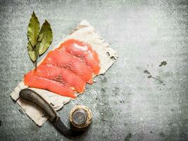 Thinly sliced salmon . photo