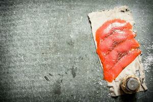 Sliced salmon with salt. photo