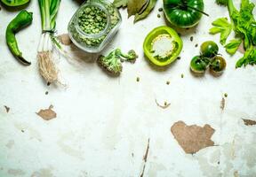 Organic food. Green vegetables with dried peas. photo