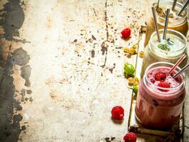 Berry smoothie gooseberries, raspberries and white currants. photo