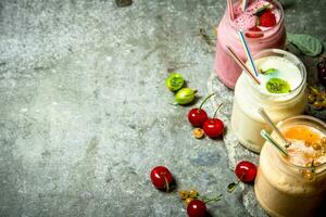 Berry smoothie made from raspberries, currants and gooseberries. photo