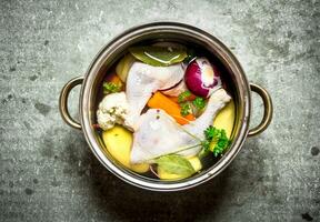 Chicken soup with fresh vegetables. photo