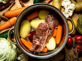 Beef soup with fresh vegetables. photo