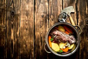 Beef soup with fresh vegetables. photo