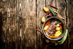 Beef soup with fresh vegetables. photo