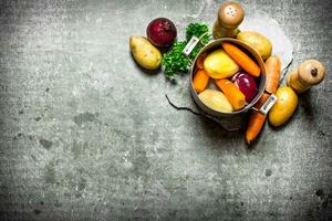 Veggie soup with vegetables and herbs. photo