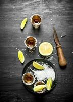 Tequila with salt and lime. photo