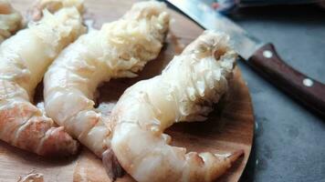 close up of king prawn on plate on table video