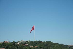 Low Angle View Of Turkish Flag Against Sky. photo