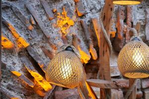 vintage lantern lamp against a wall photo