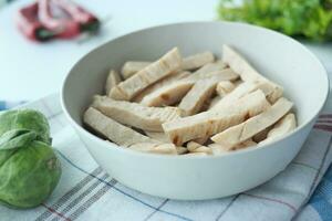 boiled Chicken fillet and vegetables on table . photo