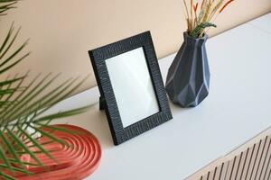 Black frame mockup in a living room photo