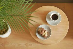 top view of cookies and tea on table photo