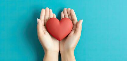 Hands holding a red heart on a blue background. AI Generated photo