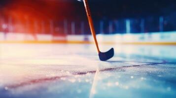 Close-up hockey stick on ice. Blurred stadium background and copy space. photo