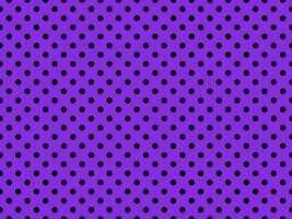 black polka dots over blue violet background photo