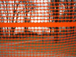 industrial style orange plastic net selective focus photo