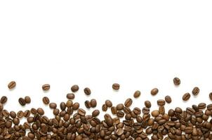 Roasted Coffee Beans background texture isolated on white background with copy space for text - Image photo