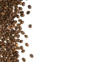 Roasted Coffee Beans background texture isolated on white background with copy space for text - Image photo