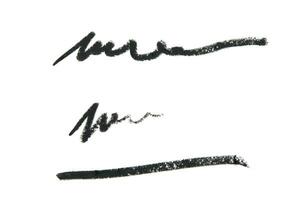 Black color Cosmetic pencil strokes on background. - Image photo