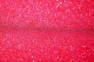 Red glitter bokeh background. Festive concept. - Image photo