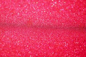 Red glitter bokeh background. Festive concept. - Image photo