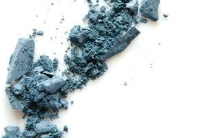 Eyeshadow cosmetic powder scattered. The concept of fashion and beauty industry. Copy Space. - Image photo