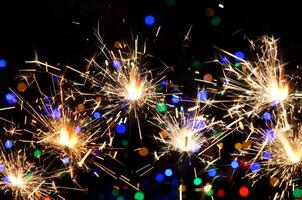 Background with a sparkler. Sparkler Bokeh Colorful sparkler. photo