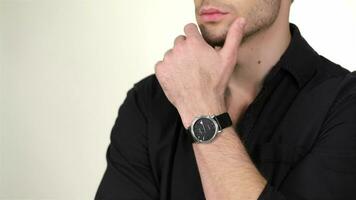 Close up pensive man on a white background video