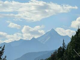 Mont Blanc mountain range under the snow in Valle d'Aosta in Courmayeur, in the summer of 2023 photo