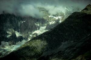 Mont Blanc mountain range under the snow in Valle d'Aosta in Courmayeur, in the summer of 2023 photo