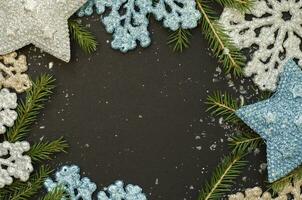 Christmas background with shining snowflakes and stars. photo