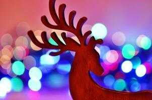 Christmas background with deer silhouette. photo