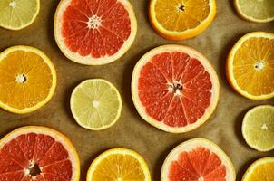 Oranges, tangerines, lemons. Composition from fresh citruses. Festive mood, holidays photo