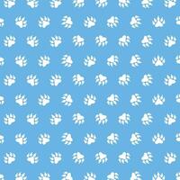 Vector seamless pattern with paw print on blue background. animal print vector illustration