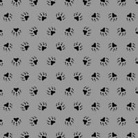 Vector seamless pattern with paw print on gray background. animal print vector illustration