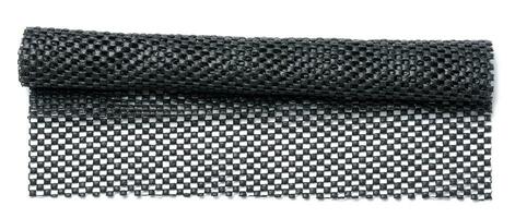 Rolled rubber mat on white isolated background photo