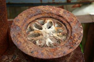 A rusty old found rustic grate from a samovar - a grate for a boiler. Horizontal photo