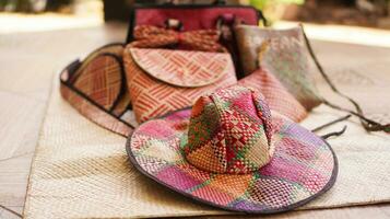 Handicrafts made from pandanus can be in the form of bags, mats and hats. This craft is a typical souvenir of the island of Bawean, East Java photo