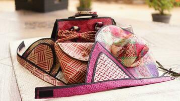 Handicrafts made from pandanus can be in the form of bags, mats and hats. This craft is a typical souvenir of the island of Bawean, East Java photo
