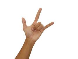 Man hand rocker on Isolated white background. Hand giving the devil horns gesture photo