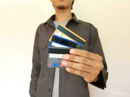 Man showing many credit card photo