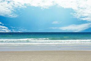 Nature landscape view of beautiful tropical beach and sea in sunny day. Beach sea space area for summer design photo