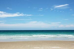 Nature landscape view of beautiful tropical beach and sea in sunny day. Beach sea space area for summer design photo