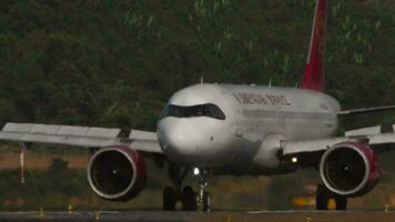 PHUKET, THAILAND JANUARY 23, 2023 - Airbus A350 of Juneyao Airlines taxiing at Phuket airport, side view video